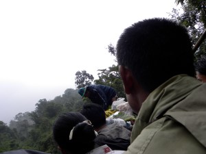 Sitting in the back of a truck - headed toward Mt. Kyaikhtiko