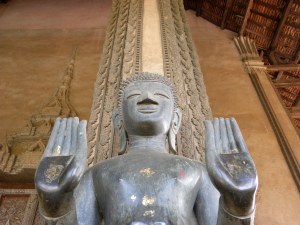 Stone Buddha image in double abhaya mudra - Ha Phreow