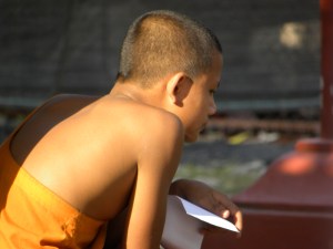 Novice monk studying - Luang Prabang