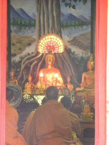 Evening prayer at temple - Luang Prabang