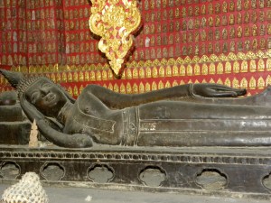 The reclining Buddha in the Red Chapel at Wat Xieng Thong